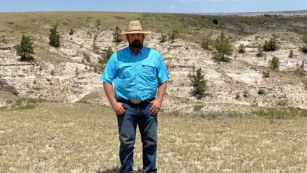 Divide Ranch agent standing at breaks
