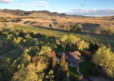 aerial home and irrigated meadow